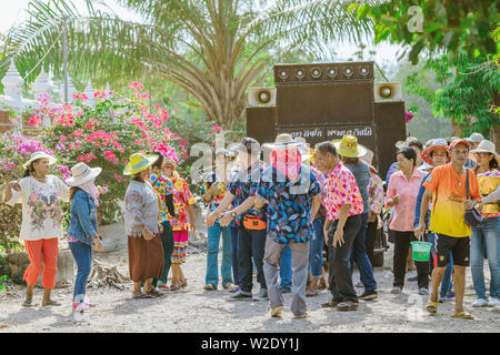 RATCHABURI-Thailand, April 14, 2019 : Unidentified Thai dancers with new monk and music band parade in Buddhist ordination ceremony at local road go t Stock Photo