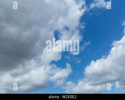 Blue sky with light cloud covering Stock Photo