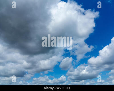 Blue sky with light cloud covering Stock Photo
