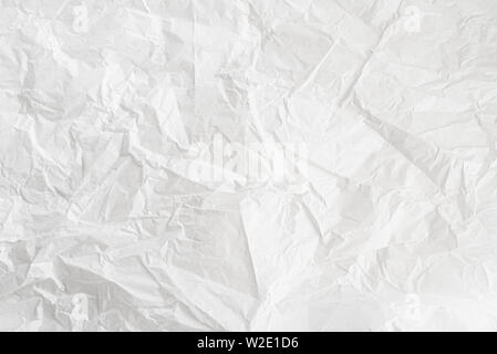 close-up shot of crumpled white wrapping paper background Stock Photo