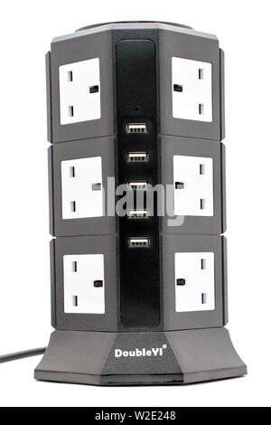 12 port mains three pin plug tower with 5 usb charging points Stock Photo