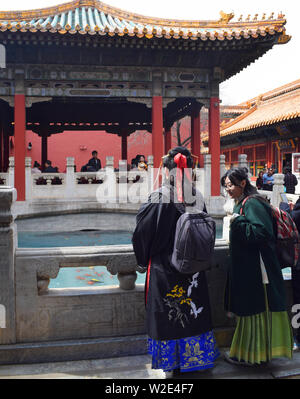 Beijing, China, March 30, 2019: Women wearing traditional kimono in a temple in the Forbidden city, Beijing. Stock Photo