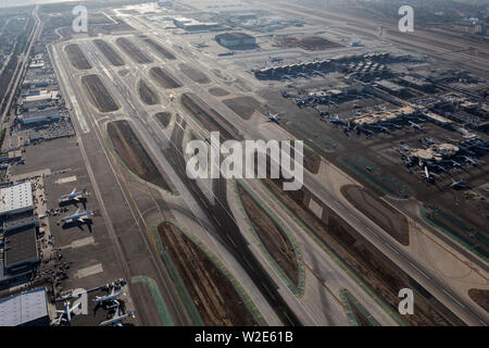 Los Angeles, California, USA - August 16, 2016:  Aerial view of runway and terminals at LAX airport in Southern California. Stock Photo