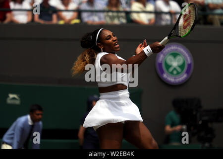 London, UK. 08th July, 2019. Wimbledon, London, UK. 8th July, 2019. Serena Williams strikes a forehand to Carla Suarez Navarro of Spain during their fourth round match against at Wimbledon today. Credit: Adam Stoltman/Alamy Live News Stock Photo