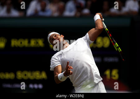 Wimbledon, London, UK. 8th July, 2019. Rafael Nadal serving to Joao Sousa during their fourth round match against at Wimbledon today. Credit: Adam Stoltman/Alamy Live News Stock Photo