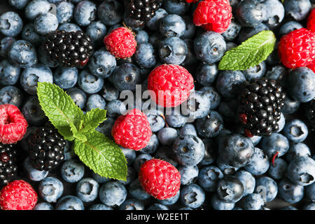 Heap of fresh berries as background, close up Stock Photo