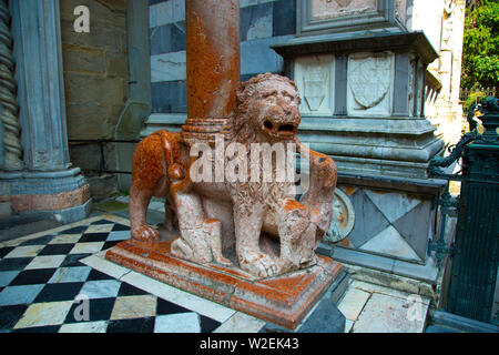 Lion sculpture in front of the church in Old Town of Bergamo city, Italy Stock Photo