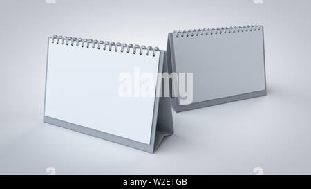 3D rendered A5 size, white blank desk spiral calendar for corporate branding presentation mockup, isolated on white with soft shadows closer view. Stock Photo
