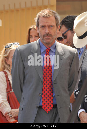LOS ANGELES, CA. August 06, 2010: Hugh Laurie on Hollywood Boulevard where Emma Thompson was honored with the 2,416th star on the Hollywood Walk of Fame. © 2010 Paul Smith / Featureflash Stock Photo
