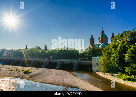 View on Isar and Sankt Lukas church in Munich. Bavaria, Germany Stock Photo