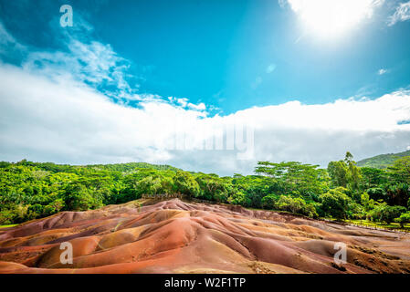 Seven coloured earth wonder in Chamarel region of tropical island Mauritius. Toned image. Stock Photo