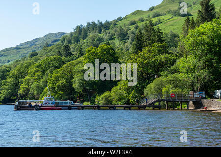 Tarbet Pier on Loch Lomond at Tarbet, Scotland, UK Stock Photo