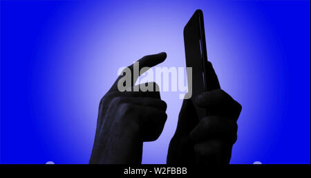 An anonymous person using a smartphone for trolling or privacy reasons Stock Photo