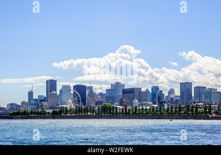 MONTREAL, CANADA - JUNE 15, 2018: Downtown buildings and waterfront of the city can be seen from St. Helen's Island. Stock Photo