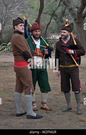 Three musicians in traditional costumes at an Asturian festival. Stock Photo