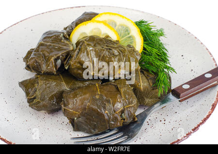 Dolma with meat, rice in grape leaves.  Stock Photo