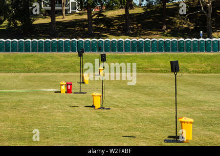 Trash bins and toilets at the Christmas in the Park event, Auckland New Zealand Stock Photo