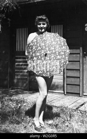 Eva Braun Collection (devet) - Eva Braun wearing only an umbrella ca