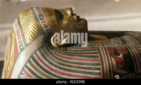 CAIRO, EGYPT- SEPTEMBER, 26, 2016: close shot of a gilded sarcophagus in cairo Stock Photo