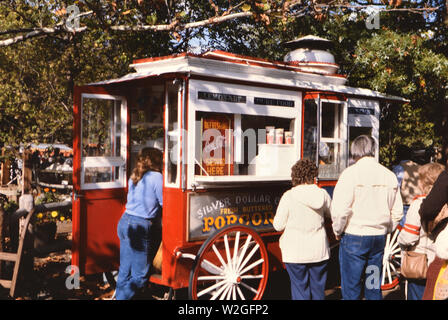 Customers waiting at a popcorn stand at Silver Dollar City near Branson Missouri ca. 1981