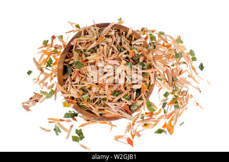 Dried lemongrass leaves in wooden bowl.  Stock Photo