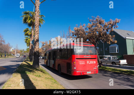 SANTIAGO, CHILE - JULY 2017: A red Transantiago bus in Las Condes Stock Photo