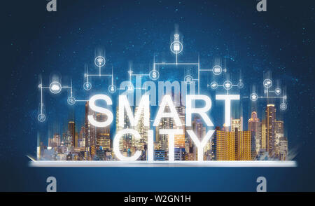 Smart city and building technology. Augmented reality buildings with online media and network application icons on digital tablet Stock Photo