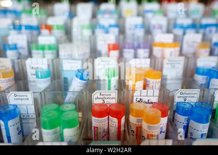 Pharmacy. Homeopathic medicines in a sliding drawer. France. Stock Photo