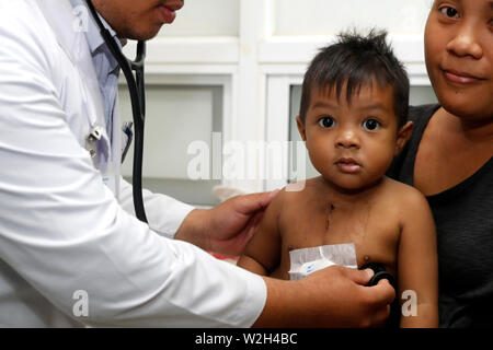 Calmette Hospital. Cardiac surgery ward.  Young boy.  Phnom Penh. Cambodia. Stock Photo