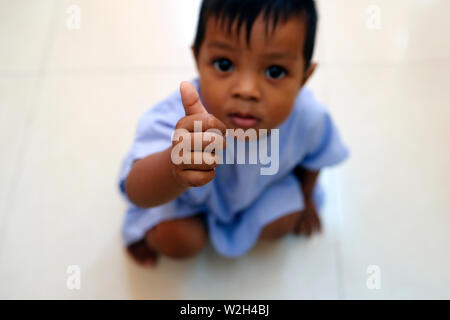 Calmette Hospital. Cardiac surgery ward.  Young boy.  Phnom Penh. Cambodia. Stock Photo