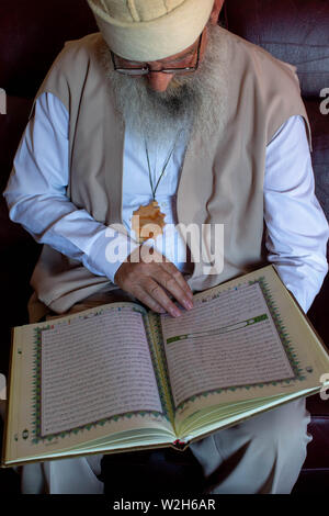 Bektachi (Bektashi) tekke in Gjakove, Kosovo. Kuran reading. Baba Mumin Lama. Stock Photo