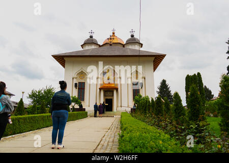 Ilfov, near Bucharest, Romania - April 30, 2019: People visiting orthodox Cernica Monastery.