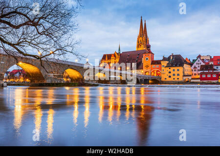 Regensburg, Germany. View from Danube on Regensburg Cathedral and Stone Bridge. Stock Photo