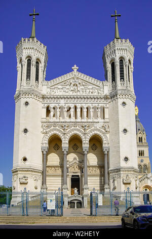 Western facade of Basilica of Notre-Dame de Fourviere is dedicated to the Virgin Mary, in Lyon, (built 1872 and 1884) Auvergne-Rhône-Alpes, France. Stock Photo