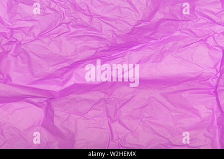 Crumpled pink paper texture as a background Stock Photo
