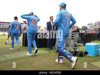 India's Virat Kohli (left), Rohit Sharma and MS Rhoni (right) ahead of the ICC World Cup, Semi Final at Emirates Old Trafford, Manchester. Stock Photo