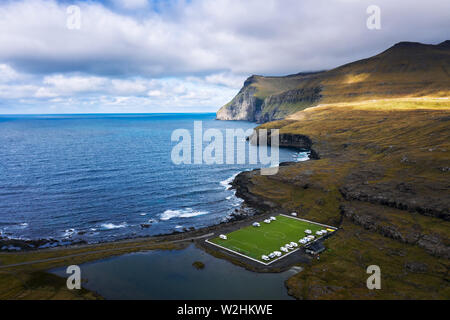 Aerial view of an old football field on the coast near Eidi in Faroe Islands Stock Photo