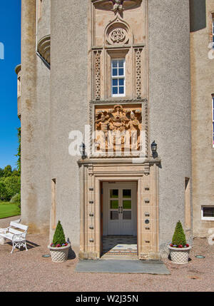 BALLINDALLOCH CASTLE AND GARDENS BANFFSHIRE SCOTLAND IN SUMMER  THE MAIN ENTRANCE AND COAT OF ARMS Stock Photo
