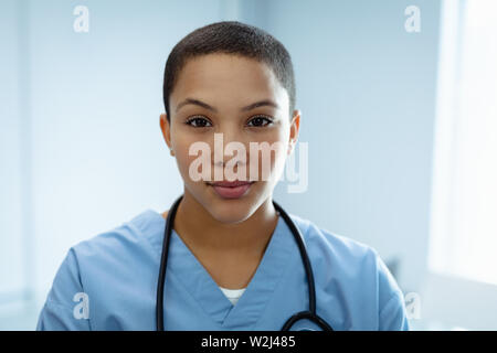 Female doctor smiling in the hospital Stock Photo