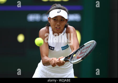 Wimbledon, UK. Wimbledon, London, UK. 9th July 2019, The All England Lawn Tennis and Croquet Club, Wimbledon, England, Wimbledon Tennis Tournament, Day 8; Zhang Shuai (chn) returns to Simona Halep (rom) Credit: Action Plus Sports Images/Alamy Live News Credit: Action Plus Sports Images/Alamy Live News Stock Photo