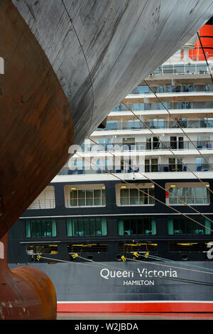 buenos aires, argentina - january 28, 2014:  the cunard cruise ship queen victoria (imo 9320556) berthed at dp world container terminal in front of a Stock Photo