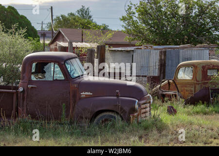 Old pickup truck from the 1950s rusting away in Alpine, Texas. Stock Photo