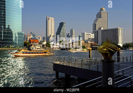 bangkok, thailand - january 25, 2019:    view from iconsiam pier over mae nam chao phraya river onto sathorn ( old customs house, mandarin oriental ho Stock Photo