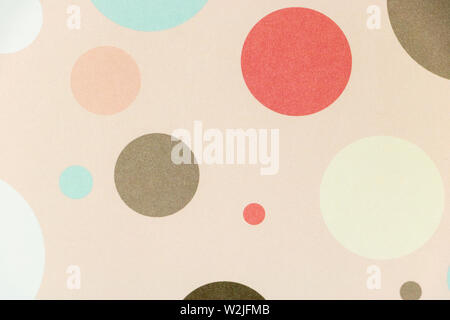 Colorful pea background on soft pink background. Thematic childhood Stock Photo