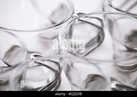 Extreme Close up Glass Coffee mug with metal handle  on white background. Minimal Background Concept. Stock Photo