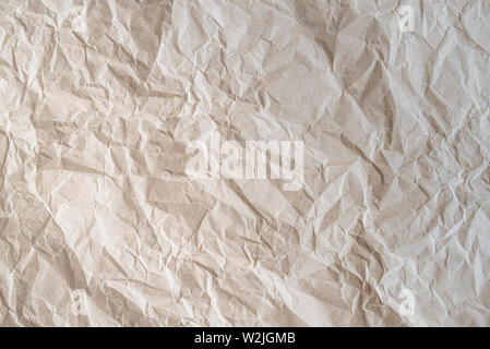 close-up shot of crumpled brown wrapping paper background Stock Photo