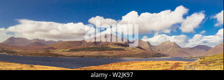 Panoramic view of Bla Bheinn (Blaven) and Cuillin Mountains on beautiful sunny day on Isle of Skye, Scotland, UK Stock Photo