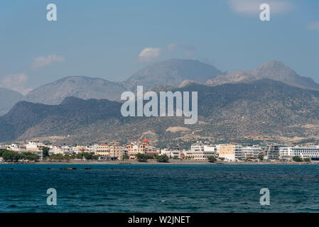 Crete, Greece. June 2019. Southern Crete and the town of Ierapetra with the Church of Agia Fotini and mountains close to the waterfront Stock Photo