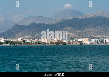 Crete, Greece. June 2019. Southern Crete and the town of Ierapetra with the Church of Agia Fotini and mountains close to the waterfront Stock Photo