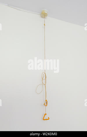 England, UK. Emergency help pull cord in a bedroom in an English care home Stock Photo